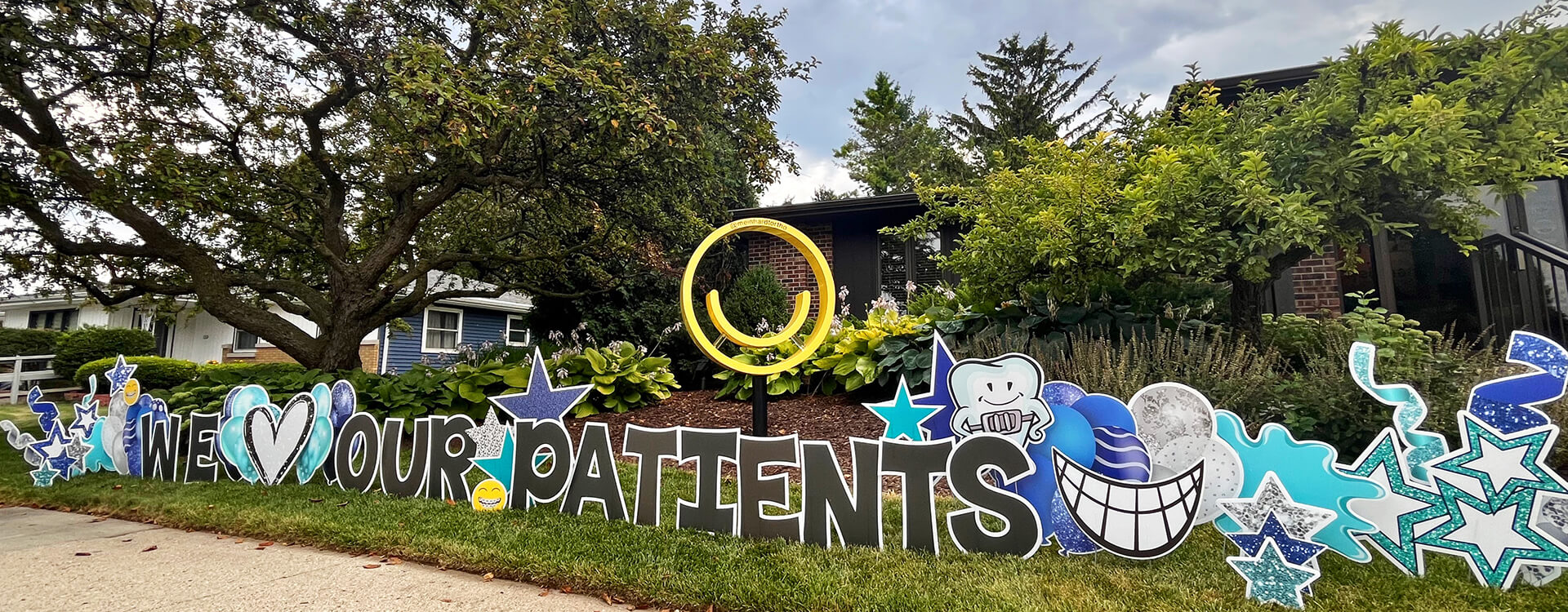 We love our patients sign outside